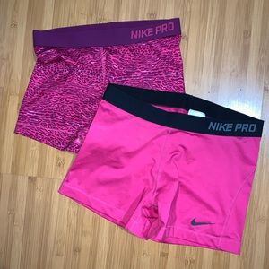 2 Pink Nike Pros